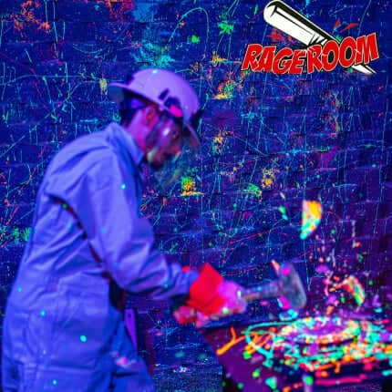 guy in splatter room with hammer