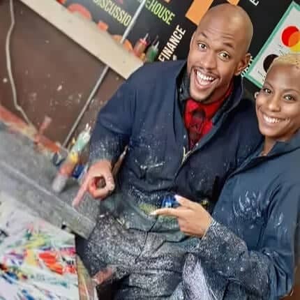 couple covered in paint