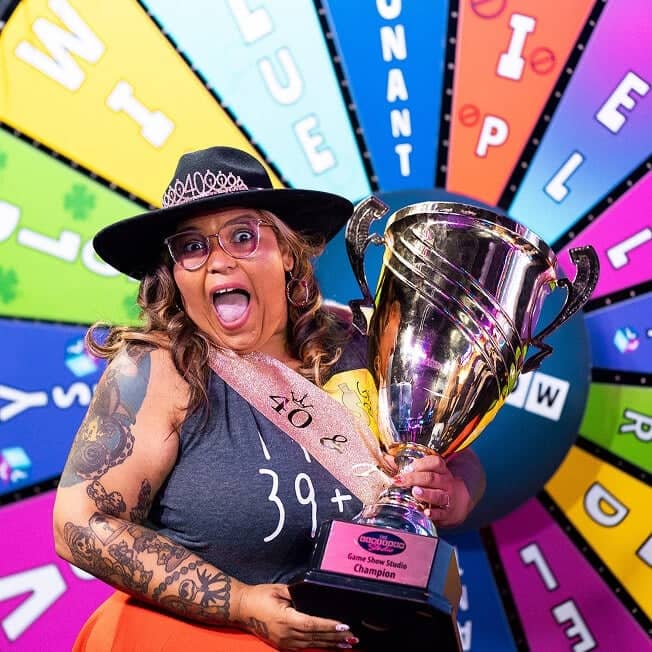 Game Show Studio participant with trophy