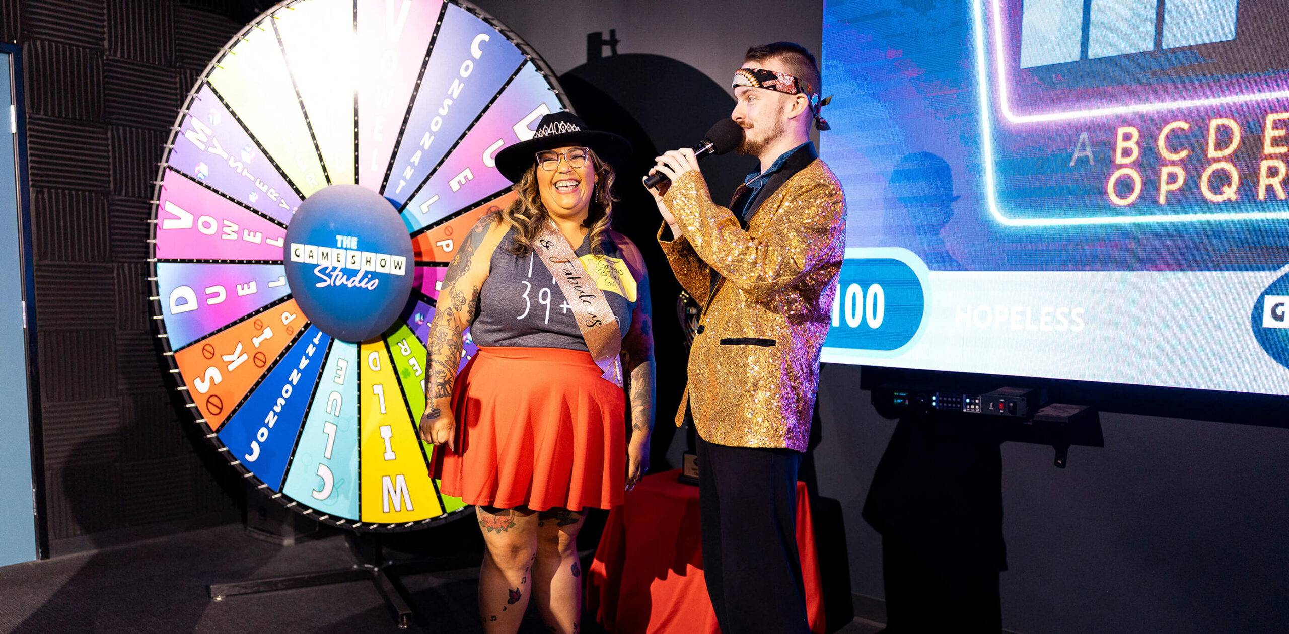 Guests celebrating on stage at The Game Show Studio