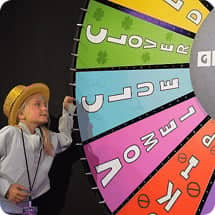 kid spinning game show wheel