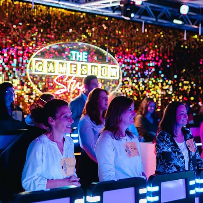 team participating in live game show studio game