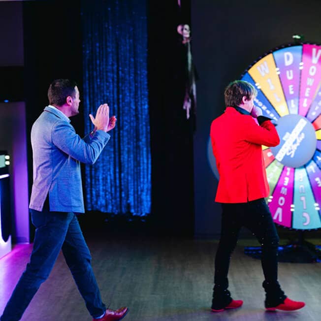game show studio host and contestant