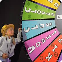 kid spinning game show wheel