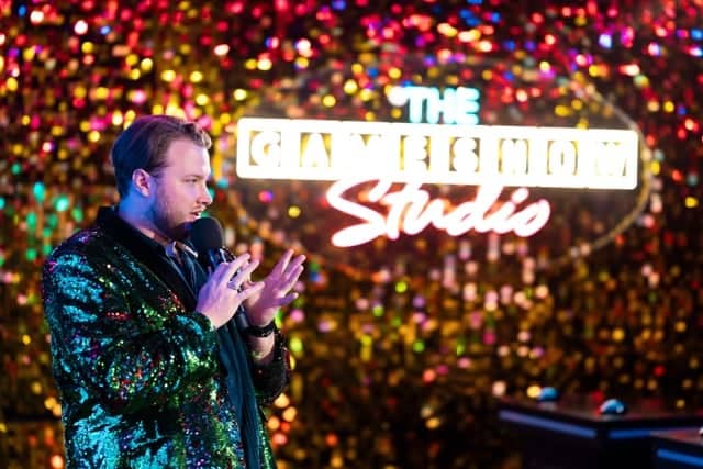 Gameshow host presenting during the experience
