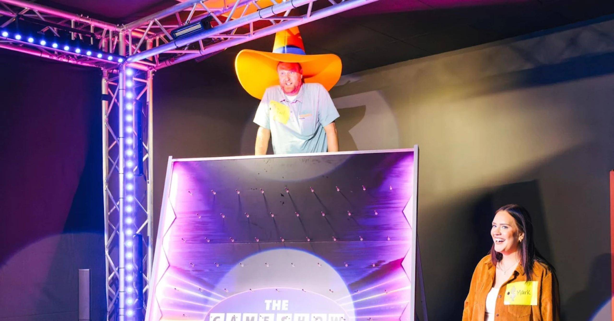 gentleman wearing big orange hat