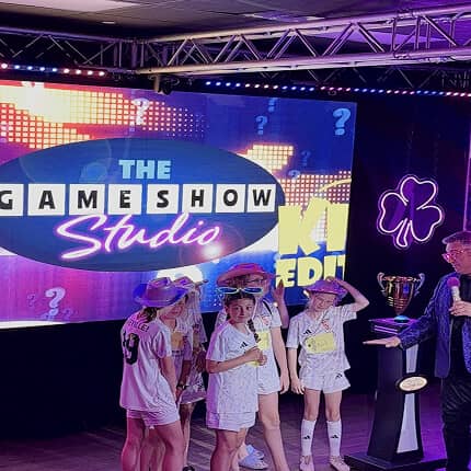 game show studio kids team participating in game