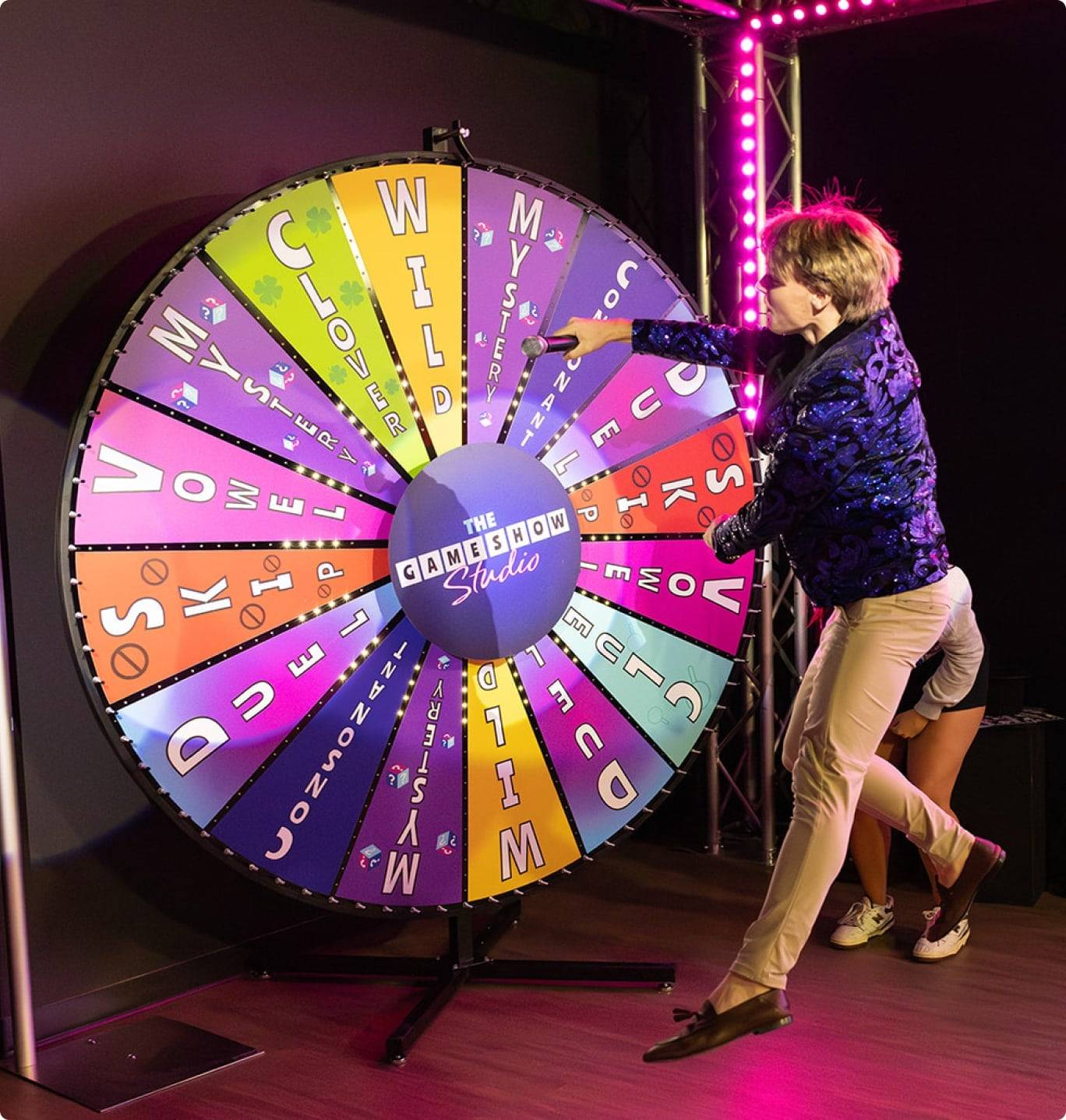 game show studio host spinning wheel
