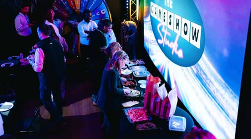 aerial view of group of players waiting in line for the catering food