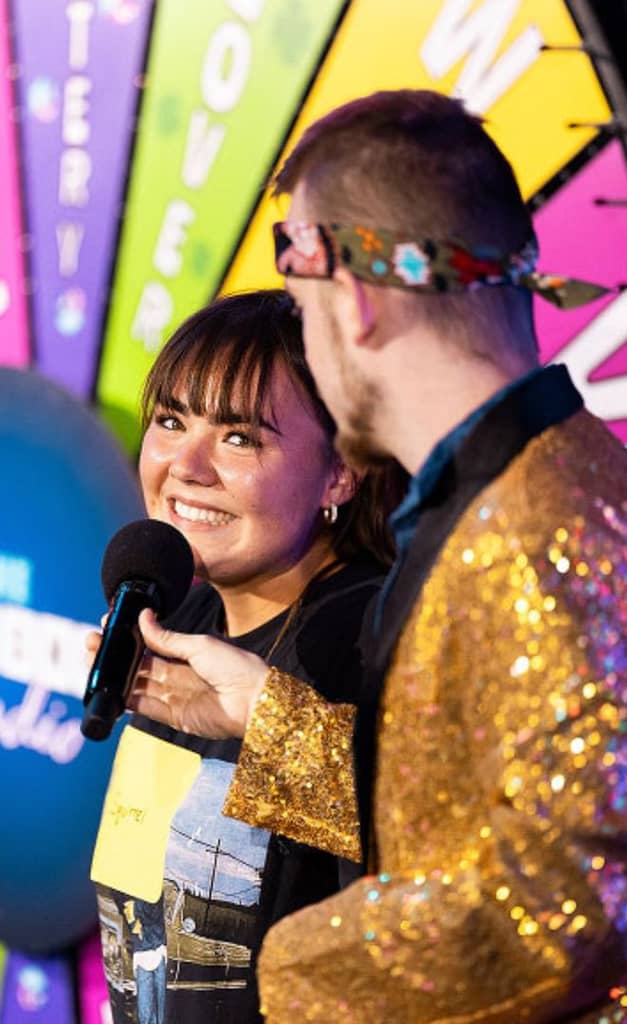 host and contestant close-up