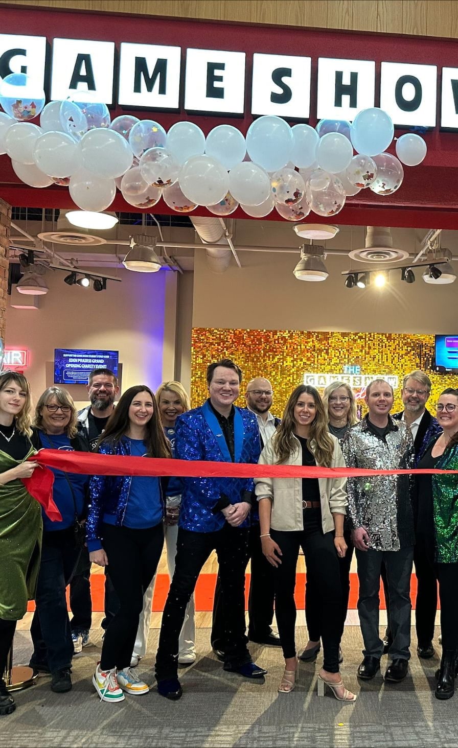Game Show Studio staff in front of store for grand opening